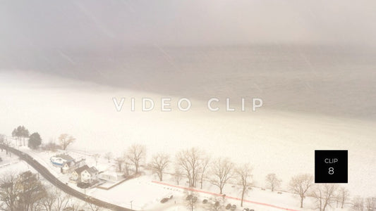 CLIP 8 - Winter Lake Ontario snow storm by frozen lakeshore