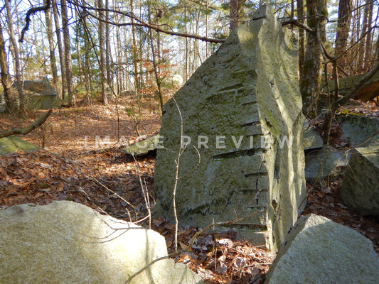 Photo - Drill marks in stone from blasting in quarry
