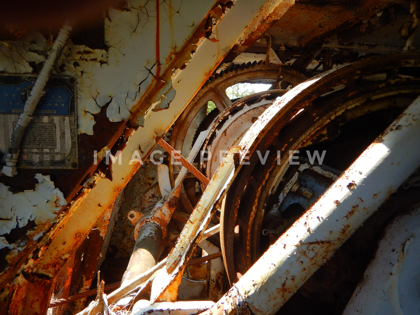 Photo - Rusting machine parts from abandoned mining operation