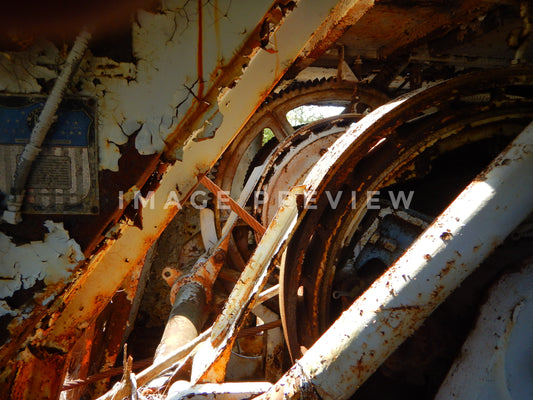 Photo - Rusting machine parts from abandoned mining operation