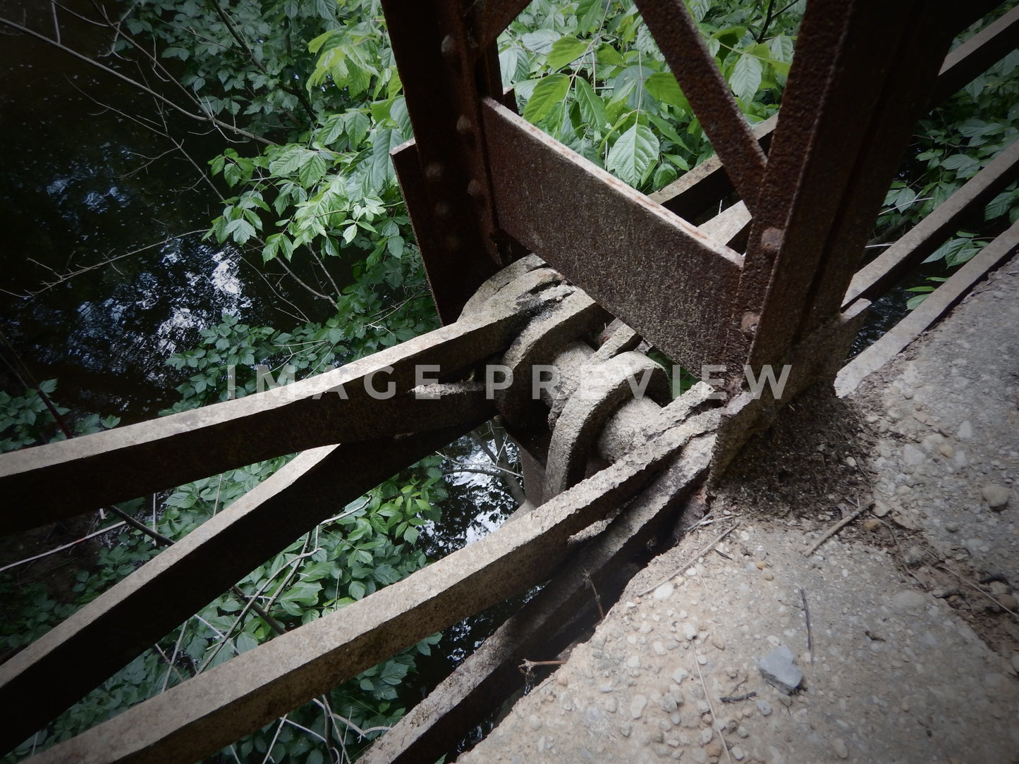 Photo - Iron works of old abandoned country road bridge