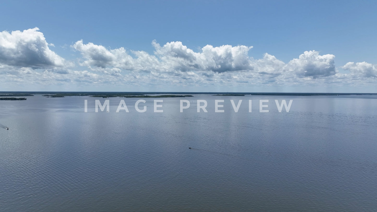 Stock photo 4k Still Frame - Lake Marion, SC calm water under blue sky and clouds