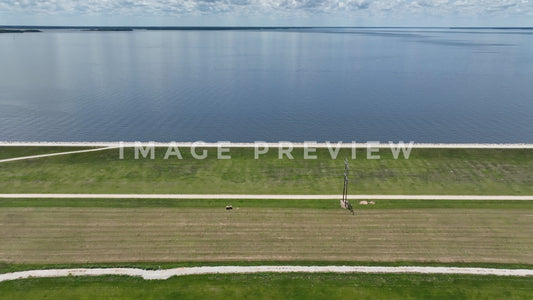 Stock photo 4k Still Frame - Lake Marion, SC calm water with earthen dam wall 