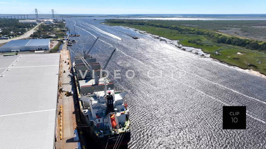 CLIP 10 - Brunswick, GA aerial turn while looking down at cargo ship docked at Georgia Ports Authority