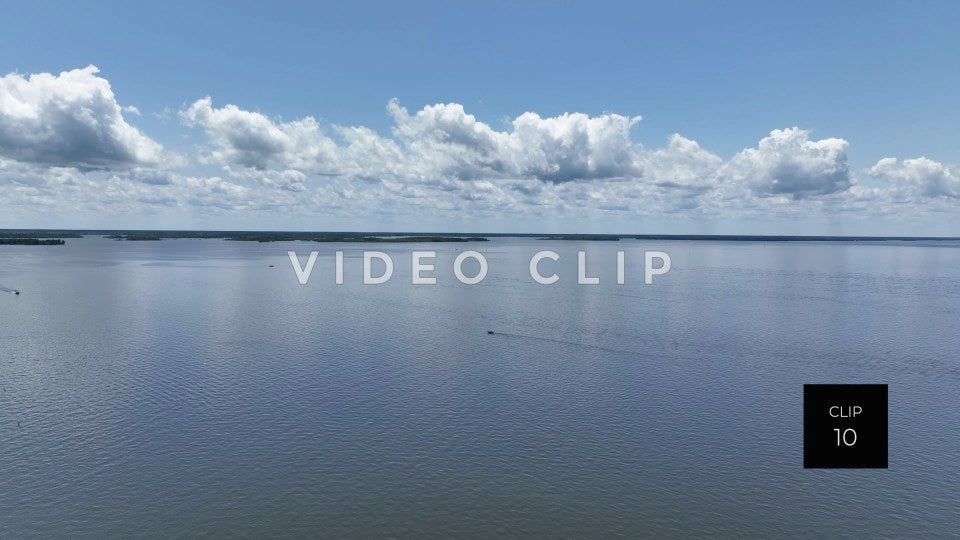 Stock video CLIP 10 - Lake Marion, SC peaceful aerial view of calm water under blue sky and clounds