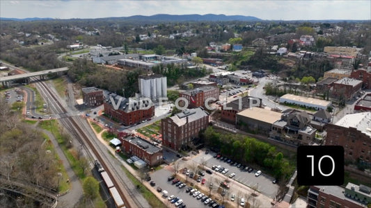 CLIP 10 - Lynchburg, VA Vol. 1 - homes and office buildings beside James river while train passes by