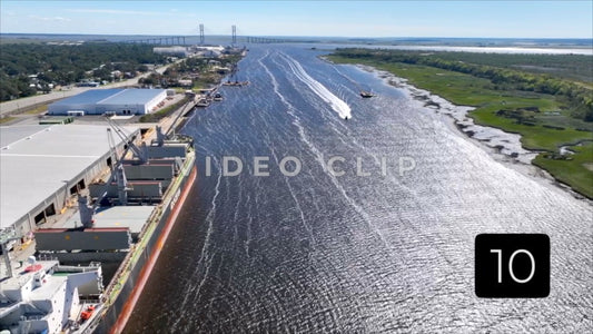 CLIP 10 - Brunswick, GA aerial turn while looking down at cargo ship docked at Georgia Ports Authority