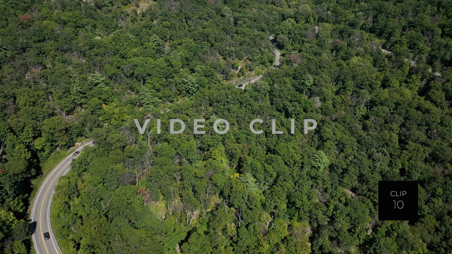 CLIP 10 - Hudson River, NY Cars traveling through mountains after crossing Bear Mountain Bridge