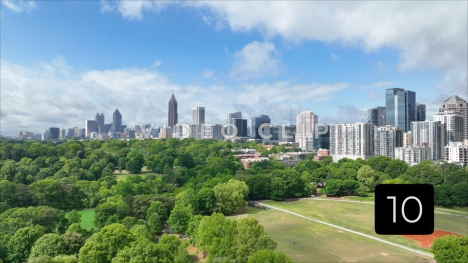 CLIP 10 -Atlanta, GA Vol. 2 - aerial Piedmont Park in foreground with city skyline office towers