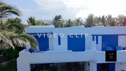 CLIP 10 - Isla Mujeras, Mexico low flight over resort villas and over road