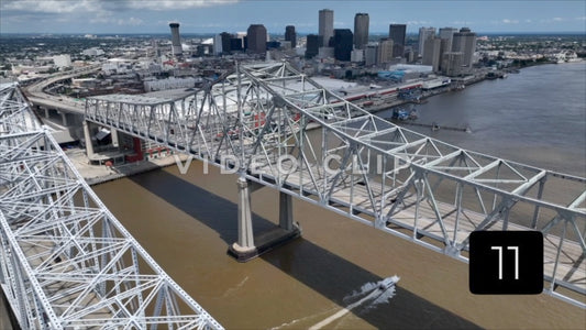 CLIP 11 - New Orleans, LA Vol. 1 - flying over Crescent City Connection Bridge as boat passes under