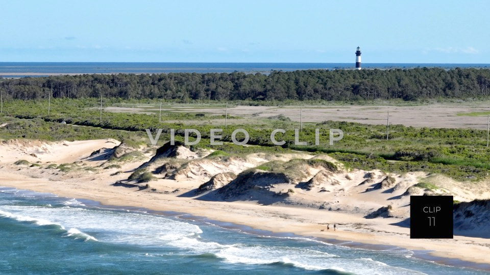 CLIP 11 - Outer Banks, NC Bodie Island Lighthouse with couple walking on beach