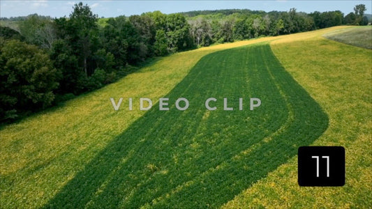 CLIP 11 - Aerial landscape of New York State countryside with pastures below