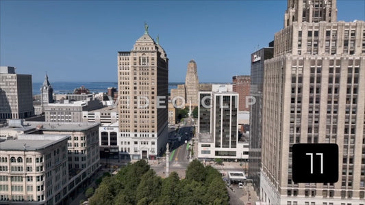 CLIP 11 - Buffalo, NY low flight drone past office buildings towards City Hall