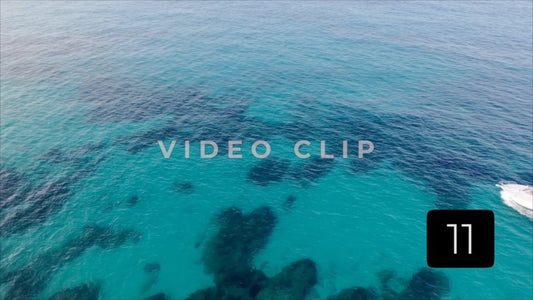 CLIP 11 - Isla Mujeras, Mexico fishing boat cruising over clear Caribbean water