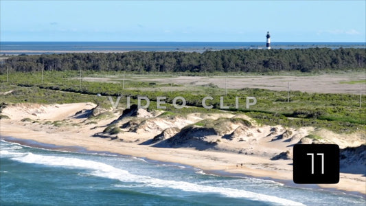 CLIP 11 - Outer Banks, NC Bodie Island Lighthouse with couple walking on beach
