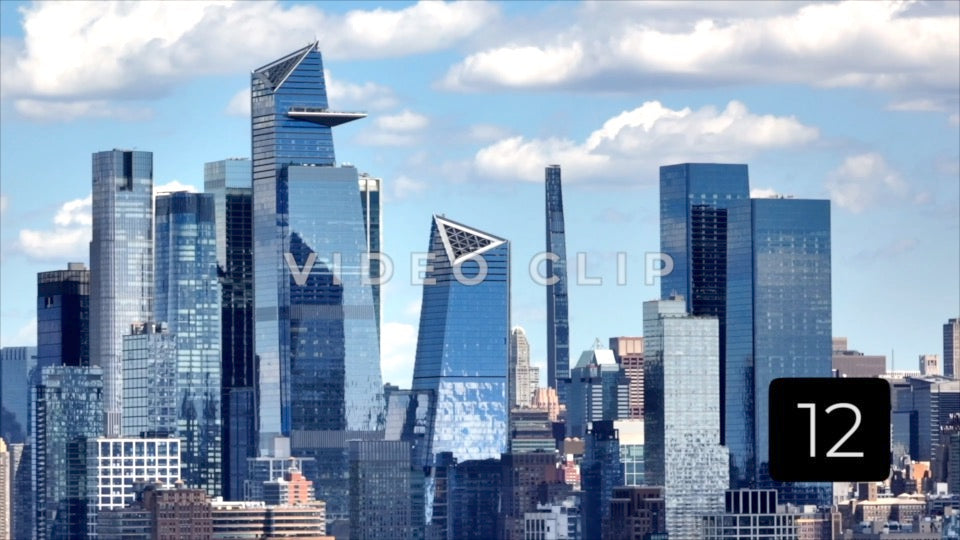 CLIP 12 - New York, NY Vol 1. - shimmering glass towers refecting blue sky and clouds