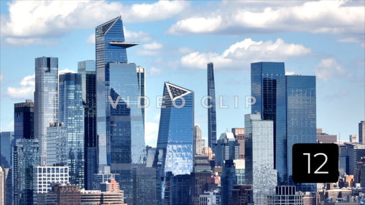 CLIP 12 - New York, NY Vol 1. - shimmering glass towers refecting blue sky and clouds