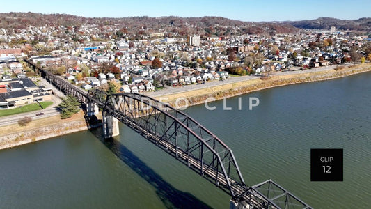 CLIP 12 - Charleston, WV birds flying over bridge with neighborhood homes by river