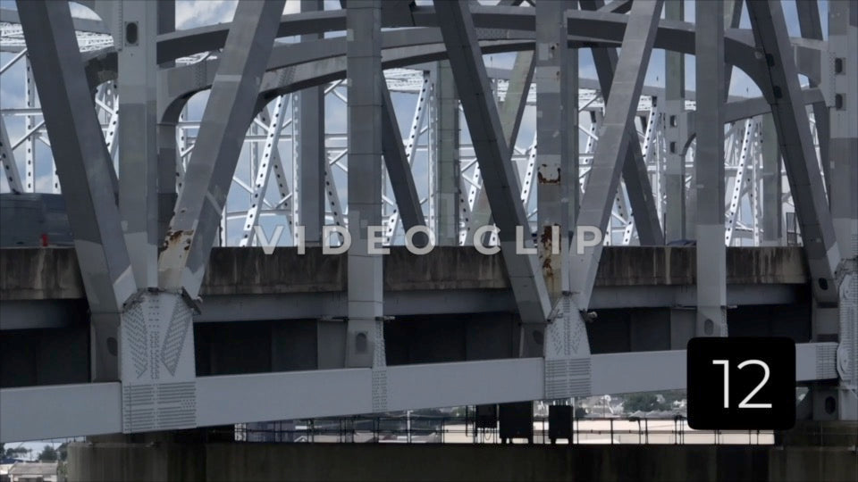 CLIP 12- New Orleans, LA Vol. 2 - rust on Crescent City Connection Bridge as cars drive past