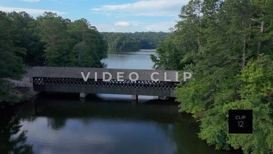 CLIP 12 - Stone Mountain Park, GA aerial flight over covered bridge