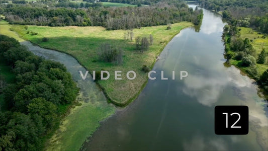 CLIP 12 - Seneca River with clouds reflections with wetland in New York State countryside