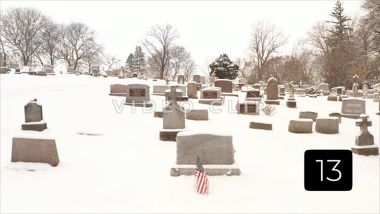 CLIP 13 - Winter Vol. 2 - Cemetery grave stones covered in snow during Winter freeze