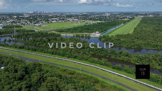 CLIP 13 - New Orleans, LA Flood wall and Levee with city skyline