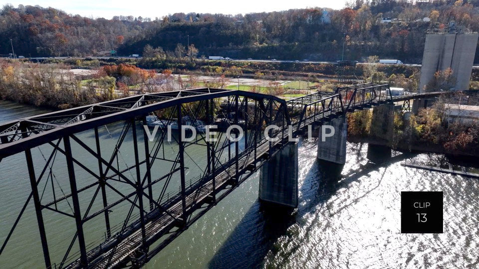 CLIP 13 - Charleston, WV slow reverse flight by train bridge as traffic passes by