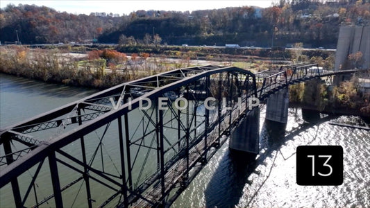 CLIP 13 - Charleston, WV slow reverse flight by train bridge as traffic passes by