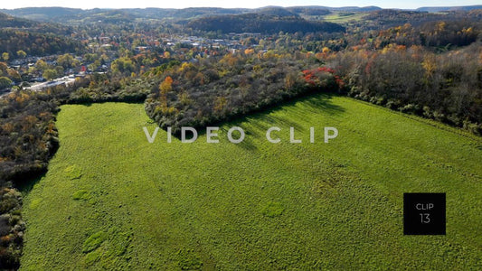 CLIP 13 - Wellsboro, PA flying over green field towards downtown