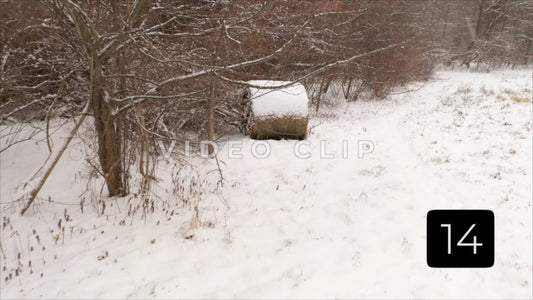 CLIP 14 - Winter Vol. 2 - Hay bail in pasture covered in freshly fallen snow during Winter
