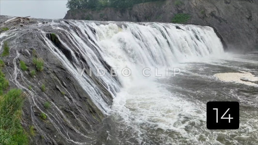 CLIP 14 - Close up aerial of Cohoes Falls with rock formations on Mohawk river