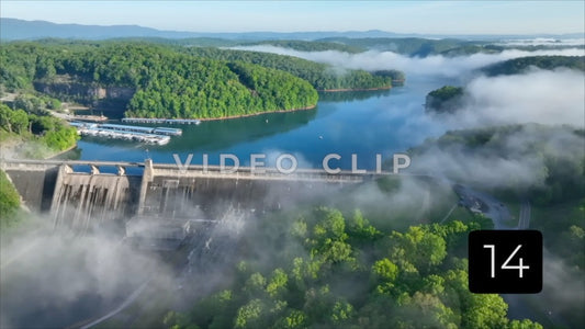CLIP 14 - Flying over Norris Dam and Reservoir during beautiful morning with mist over water