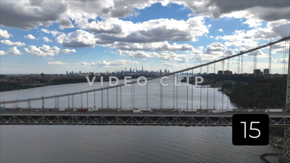 CLIP 15 - New York, NY Vol 1. - cars crossing Hudson River on George Washington Bridge with city skyline on horizon