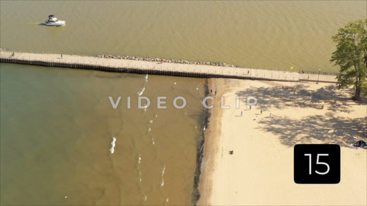 CLIP 15 - Rochester, NY Vol. 5 - People walking shoreline at Ontario Beach Park