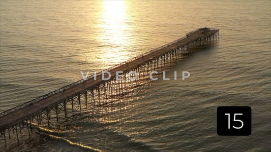 CLIP 15 - Pawleys Island, SC slow turn over fishing pier in morning sunlight