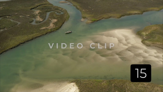 CLIP 15 - Cherry Grove Beach, SC Waties Barrier Island tidal marsh with fisherman