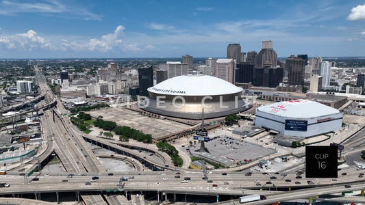 CLIP 16 - New Orleans, LA Caesars Superdome downtown and cars traveling on highways