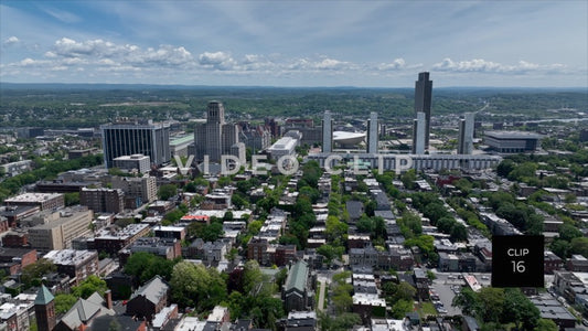 CLIP 16 - Albany, NY aerial flight over urban homes towards downtown
