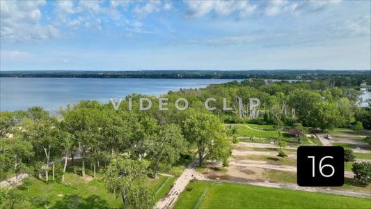 CLIP 16 -  Erie, PA Presque Isle State Park aerial with view of lighthouse in the distance