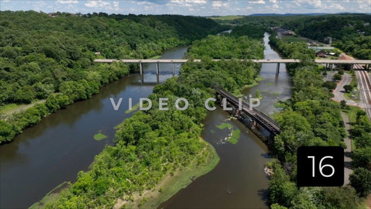 CLIP 16 - Lynchburg, VA Vol. 2 - aerial view of James River flowing by downtown