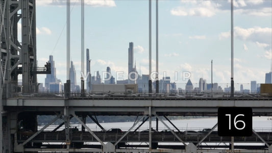 CLIP 16 - New York, NY Vol 1. - close view of George Washington Bridge with traffic and biker