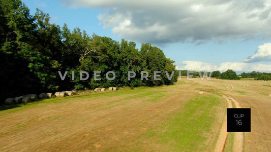 CLIP 16 - Eatonton, GA - country road on farmer's field
