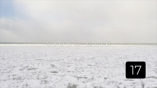 CLIP 17 - Winter Vol. 3 - Winter Lake Ontario flying over frozen shoreline to open water