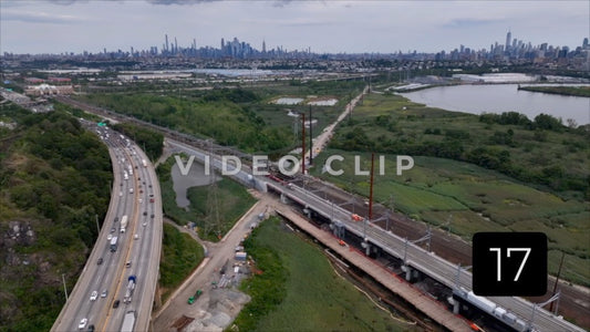 CLIP 17 - New York, NY Vol 2. - Interstate 95 traffic crossing Hoboken River with NY skyline in distance