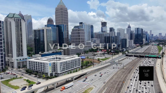 CLIP 18 - Atlanta, GA Midtown skyline with 75/85 Interstate traffic