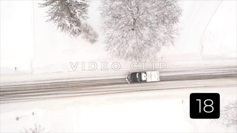 CLIP 18 - Winter Vol. 4 - Truck with snow plow drives through neighborhood in Winter with snow