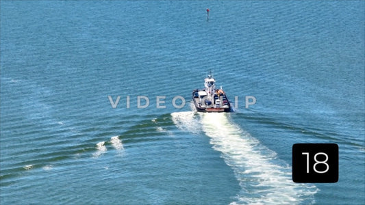 CLIP 18 - Outer Banks, NC 7X zoom of Ocracoke Ferry crossing inlet