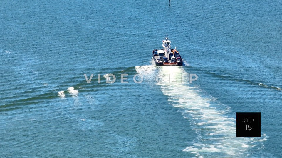 CLIP 18 - Outer Banks, NC 7X zoom of Ocracoke Ferry crossing inlet